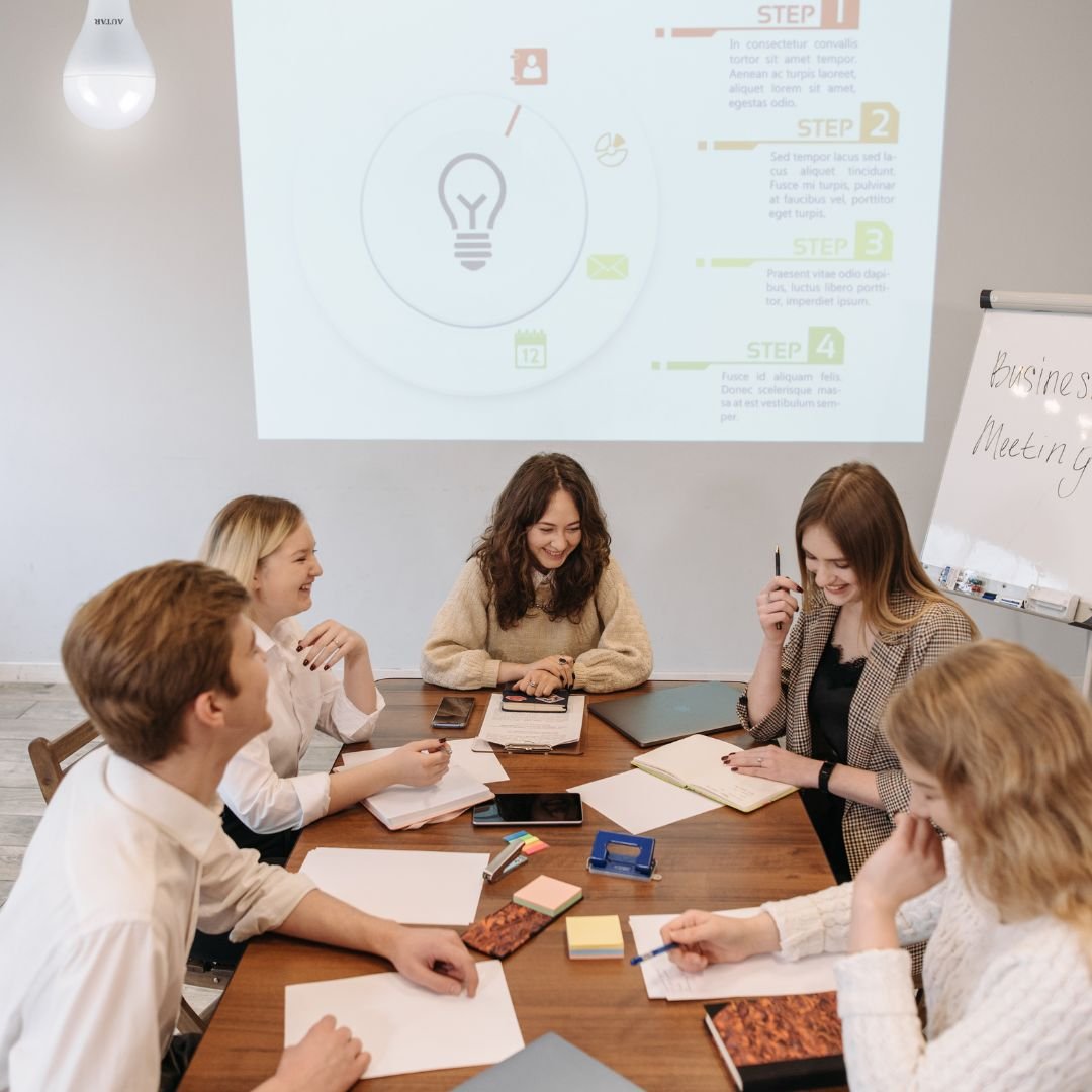 An Autar LED lamp lighting a meeting room